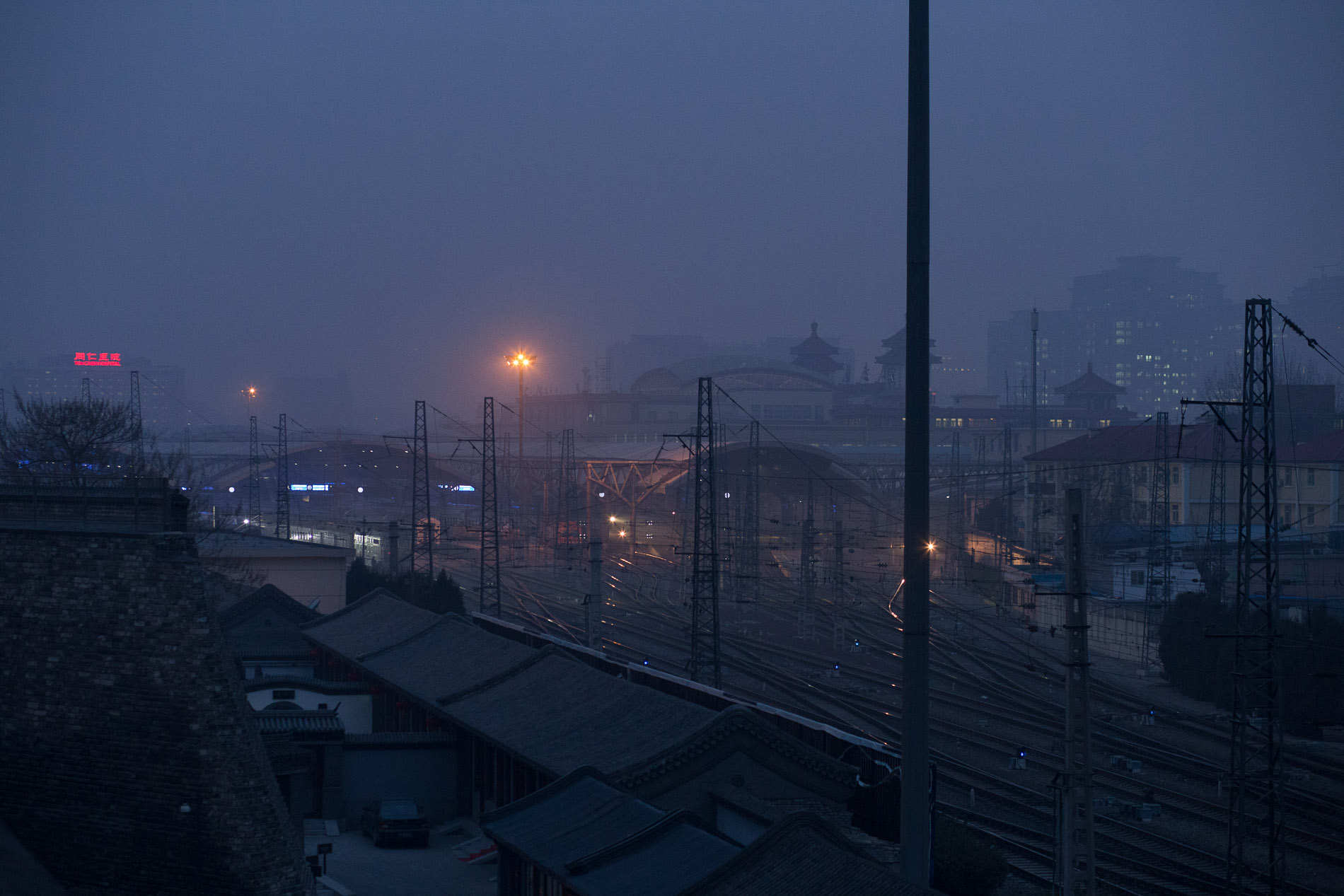 Dust over Beijing railway station.